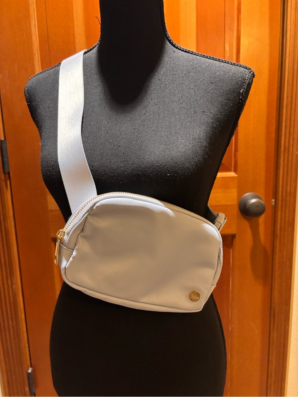 The Darling Effect Light Blue Crossbody Belt Bag.